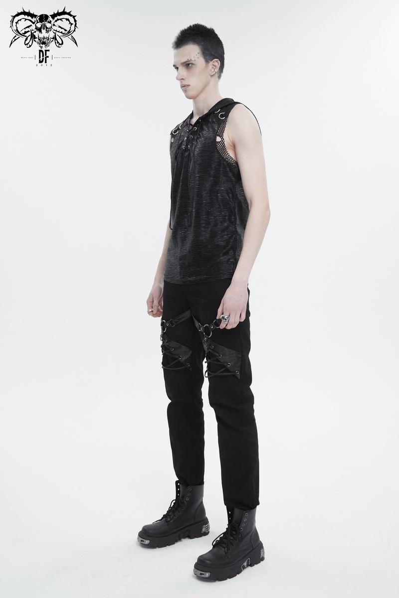 Men's punk rock fitted pants with leather harness, styled with edgy black top and boots against a plain background.