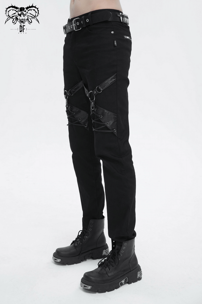 Men's fitted punk rock pants in black with leather harness and zipper pockets, showcasing an edgy style.