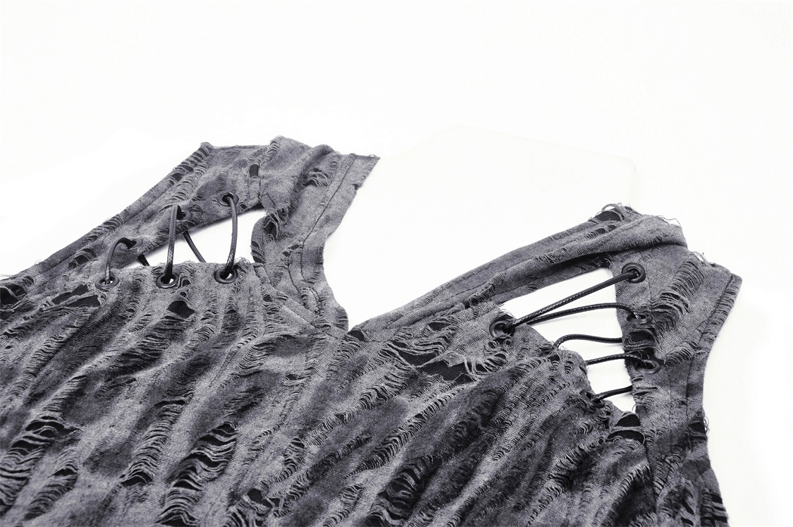 Close-up of a punk rock off-shoulder hoodie with edgy cutouts and ripped fabric detailing.