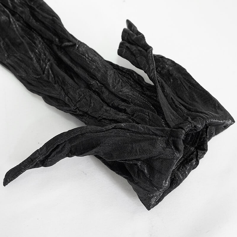 Close-up of a textured black fabric with a tie detail, perfect for punk rock style clothing accessories.