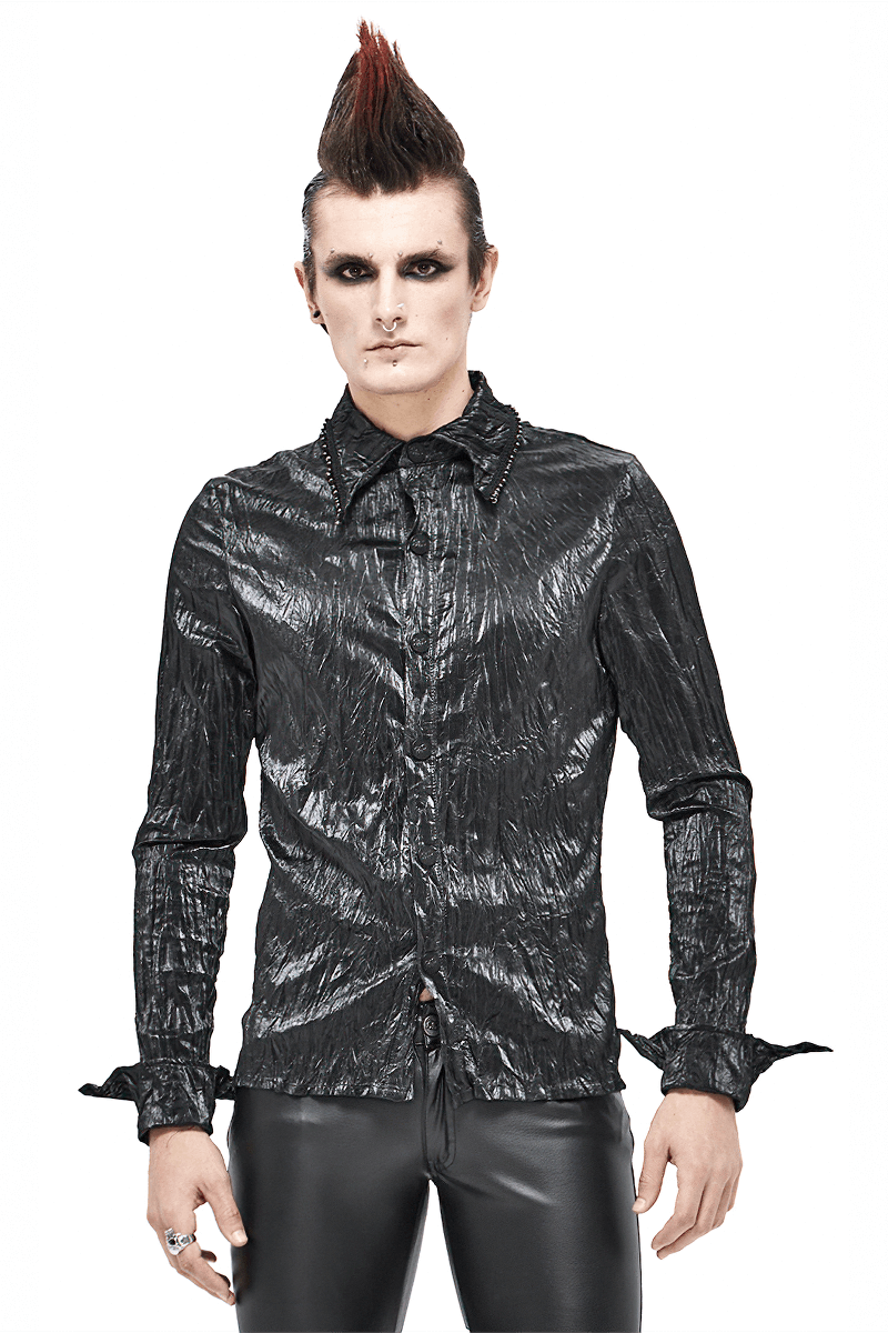 Stylish male model wearing a punk rock black long-sleeved shirt with unique texture, perfect for alternative fashion.