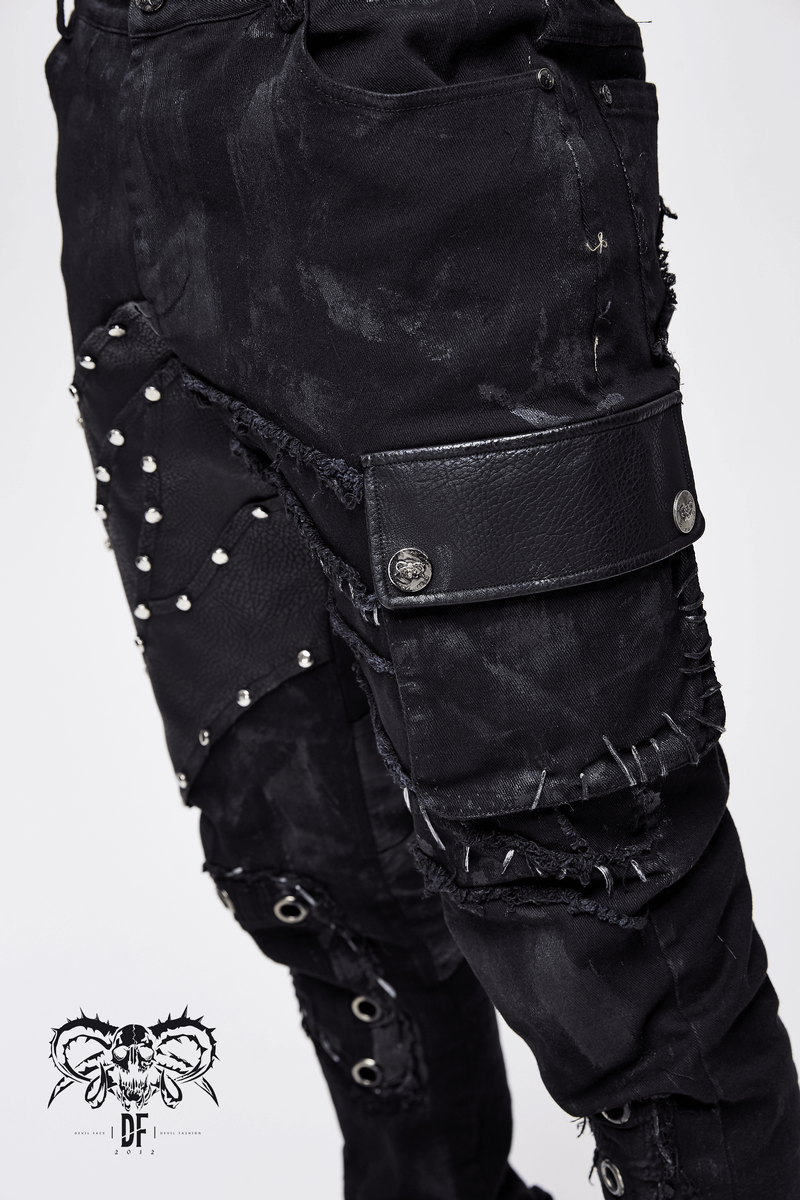 Men's black punk rock trousers with silver studs and leather accents, featuring a stylish distressed look and unique design.