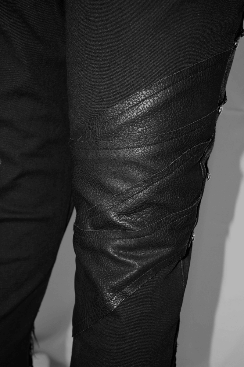 Close-up of punk rock trousers with stylish black leather details and silver studs for a bold biker look.