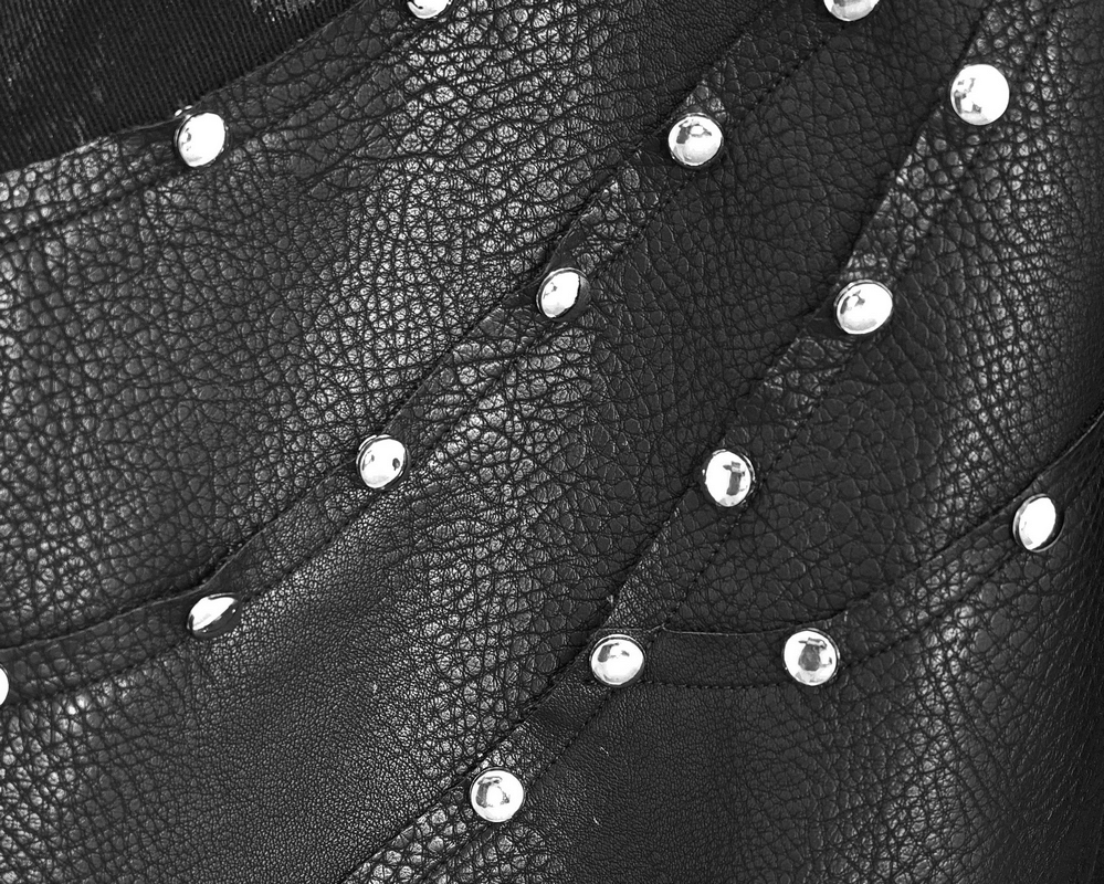 Close-up of black punk rock trousers with silver studs detailing, showcasing quality material and stylish design.