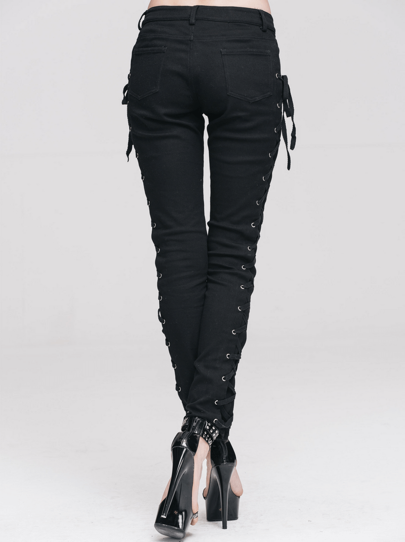 Back view of women's black skinny pants with lace-up detailing, showcasing punk rock style and form-fitting design.