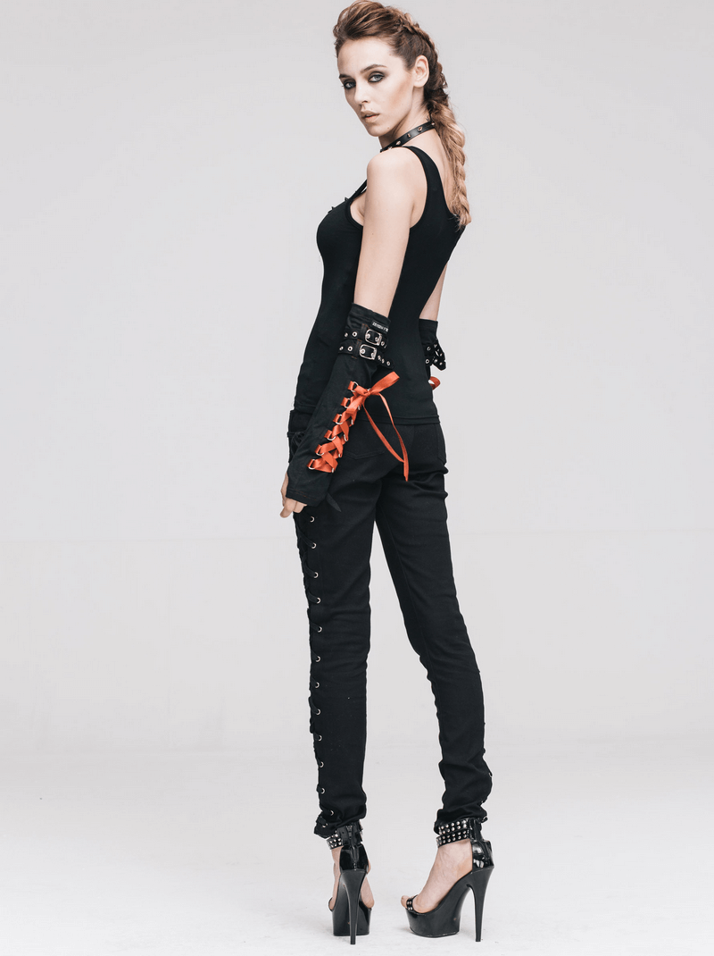 Stylish model showcasing punk rock women's skinny pants with lace up design on both sides, perfect for edgy fashion statements.