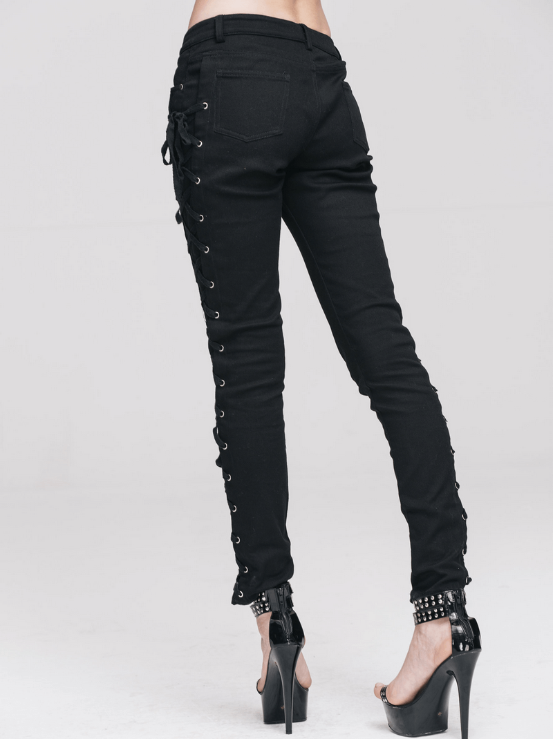 Back view of women's black skinny pants with lace-up details, embodying punk rock style and chic fashion.