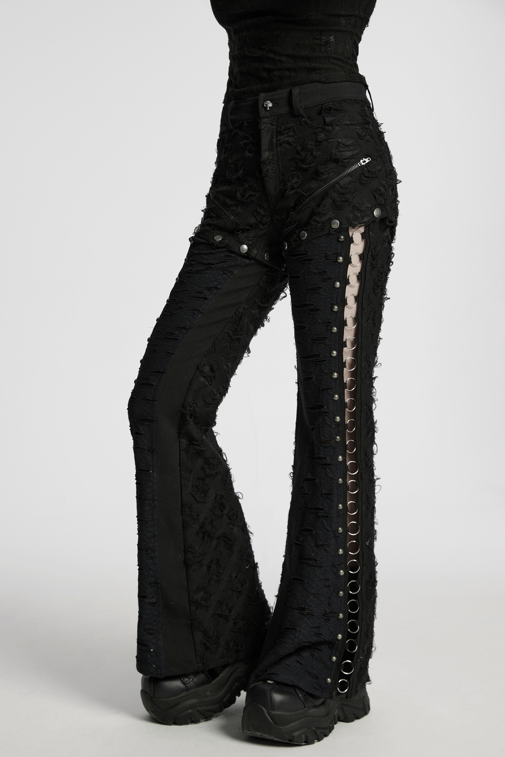 Punk rose-embellished split wide leg tattered pants with iron ring detailing and snap button connections.