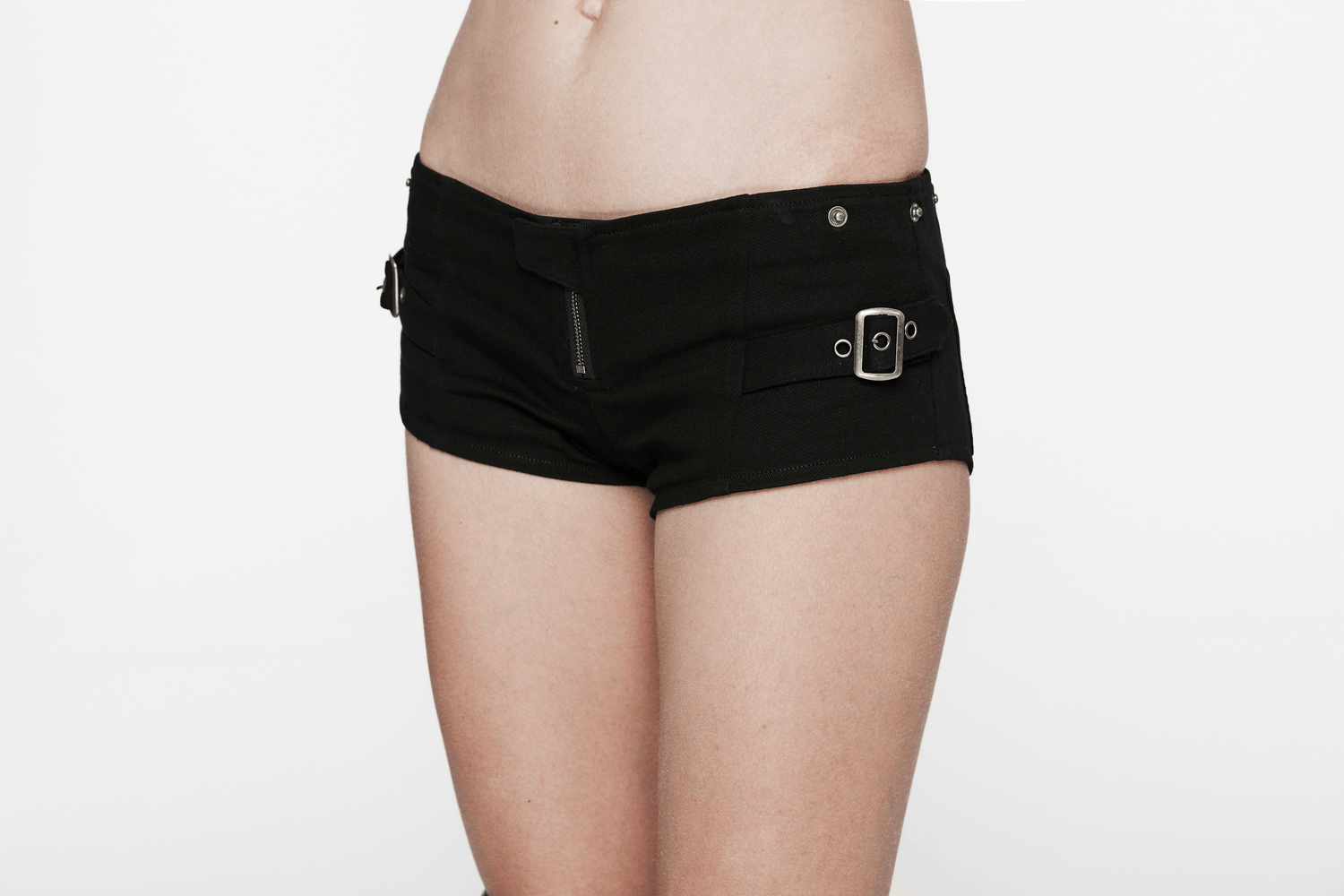 Edgy black shorts with metal buckle details, perfect for a punk-inspired look or summer outfit.