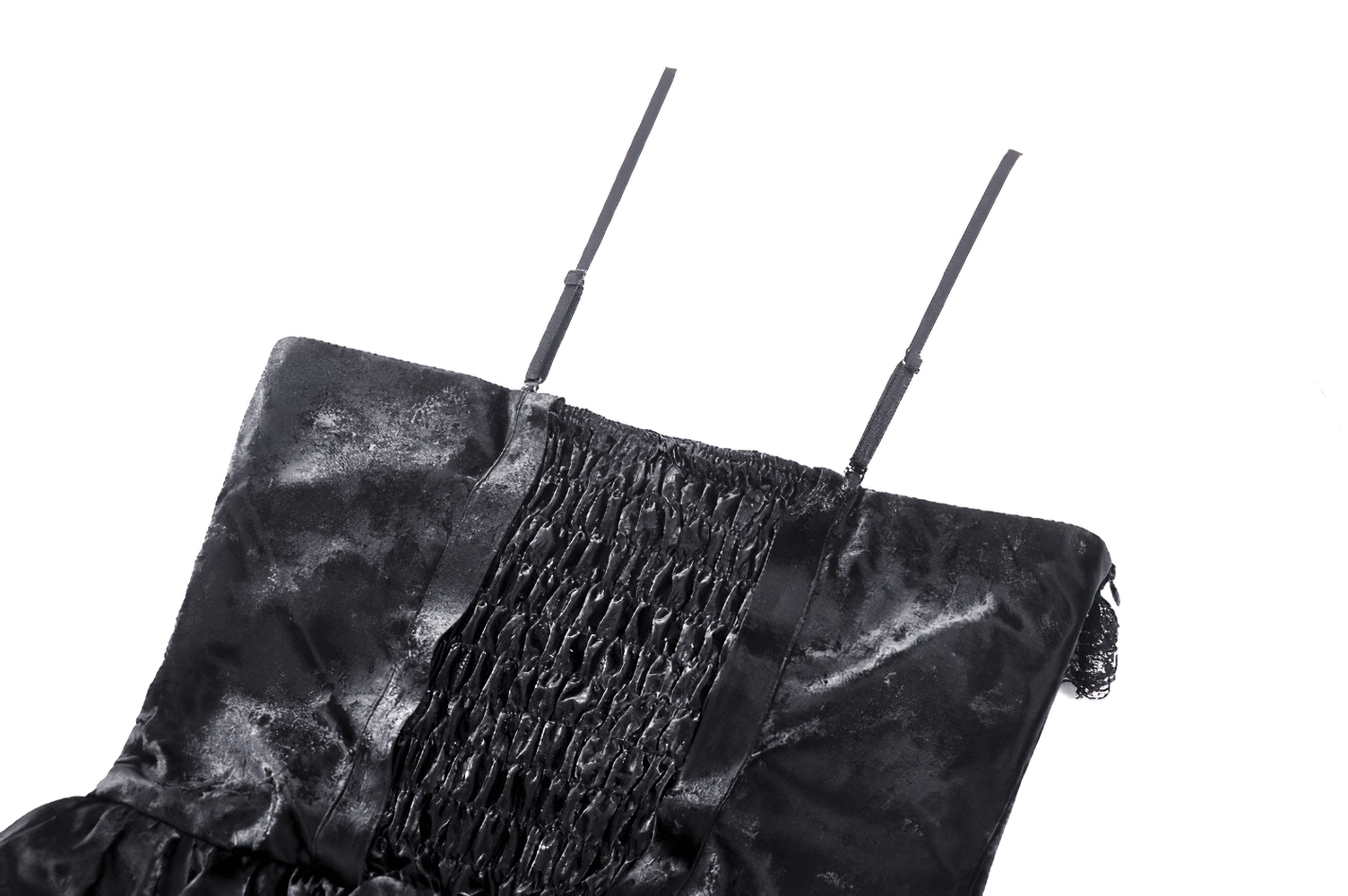 Close-up of black PU leather dress with smocked back and adjustable straps, showcasing gothic fashion details.