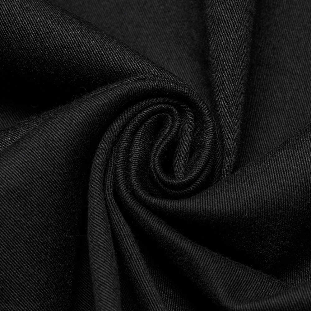 Close-up of black twill fabric, showcasing its smooth texture and flexibility, perfect for stylish punk shirts.