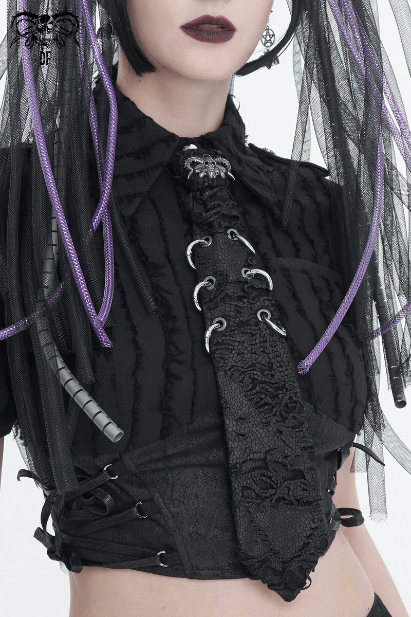 Stylish women's punk skull necktie with metal rings, paired with a gothic blouse for a bold alternative look.
