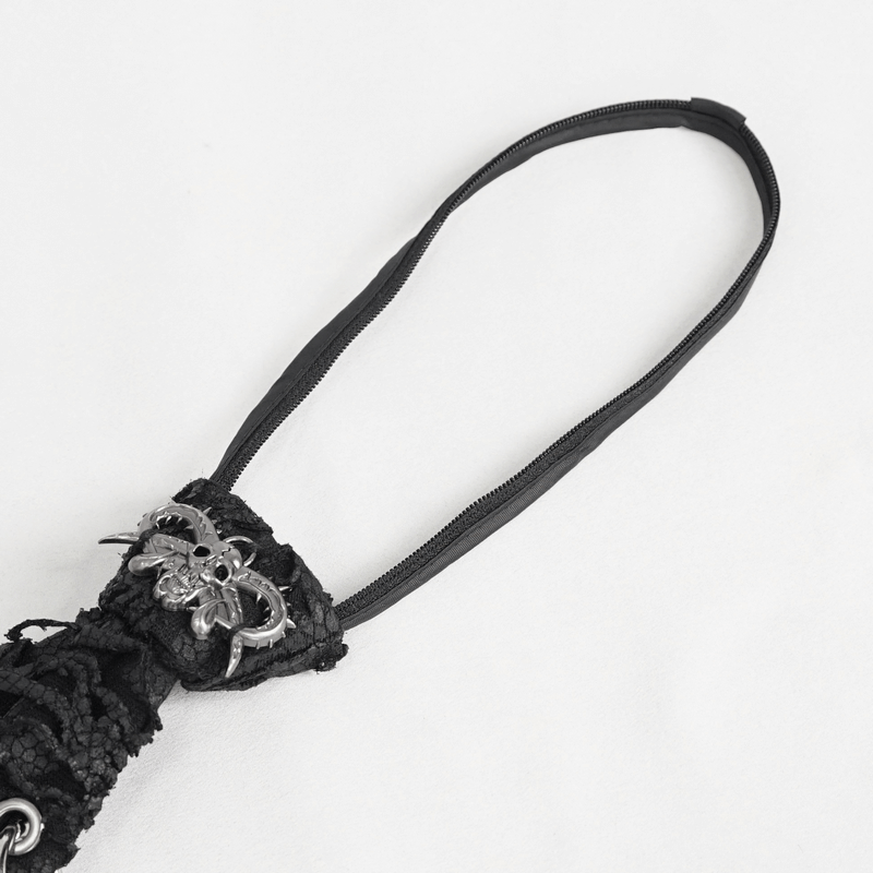 Punk skull necktie detail with metal rings, stylish gothic collar tie for women on a white background.