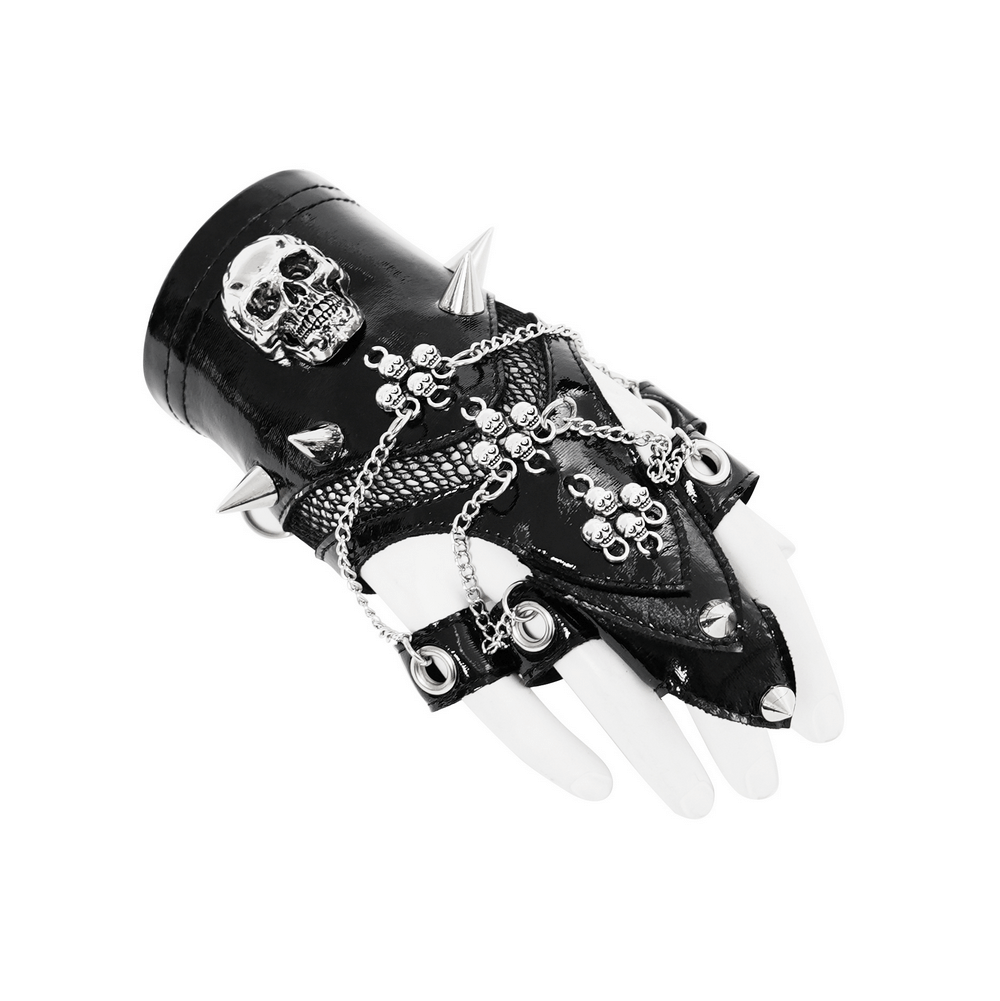 Punk skull studded half-finger gloves with chains, featuring spikes and gothic accents for edgy fashion lovers.