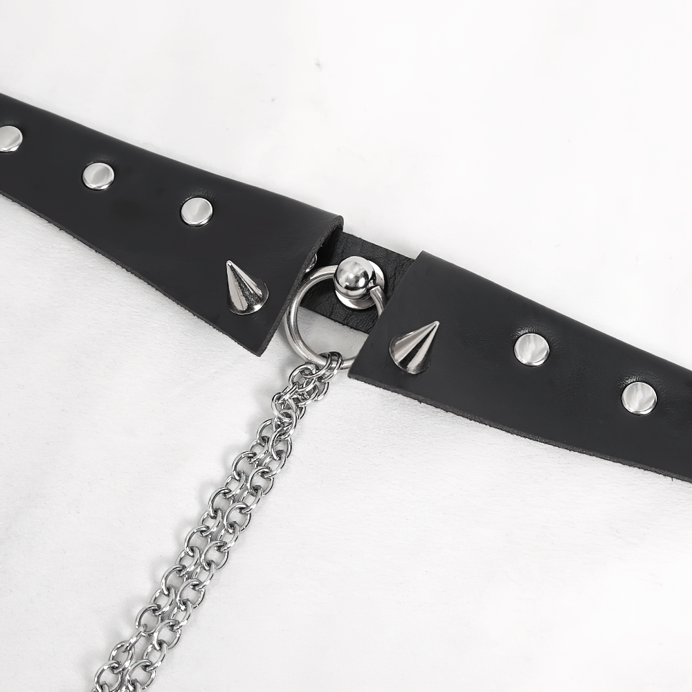 Close-up of a spiked belt choker with rivets and a chain, perfect for punk fashion lovers.