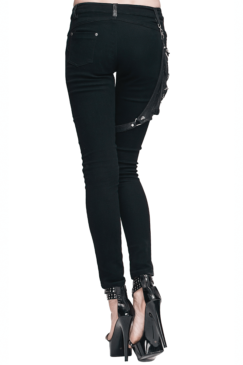 Back view of women's punk spliced black pants with stylish straps, perfect for a rock-inspired outfit.