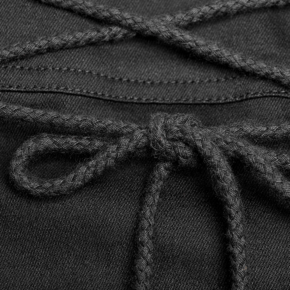 Close-up of a braided black lace detail on a punk skirt, adding edgy flair to the design.
