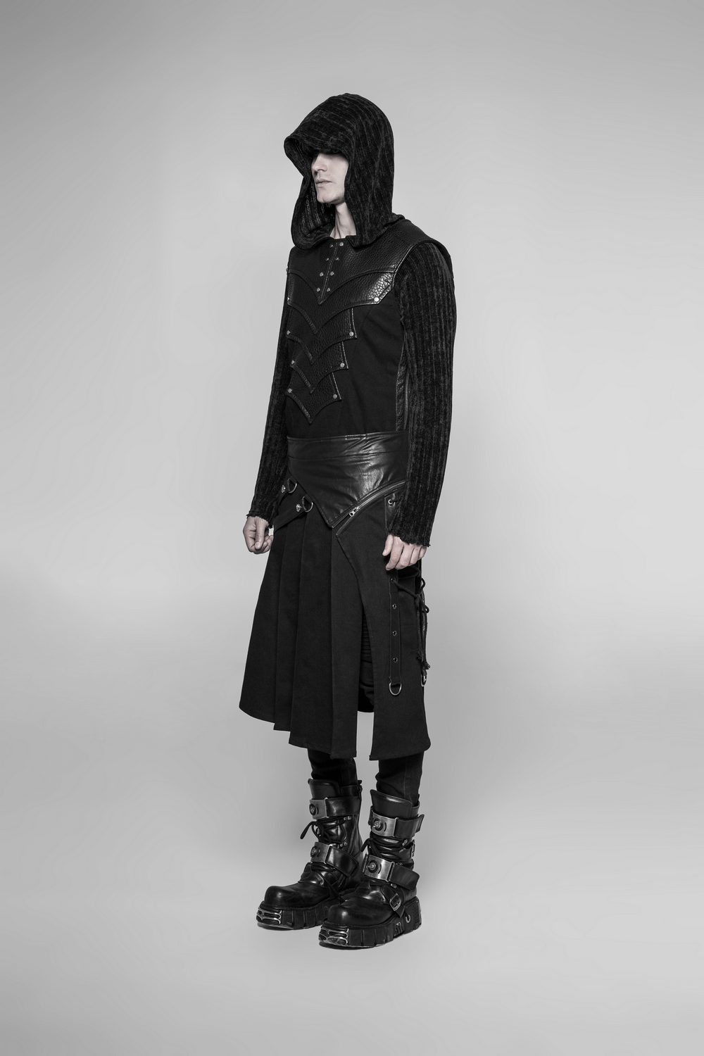Punk spliced PU leather detachable half kilt skirt on model, showcasing edgy style with adjustable buckle and pockets.
