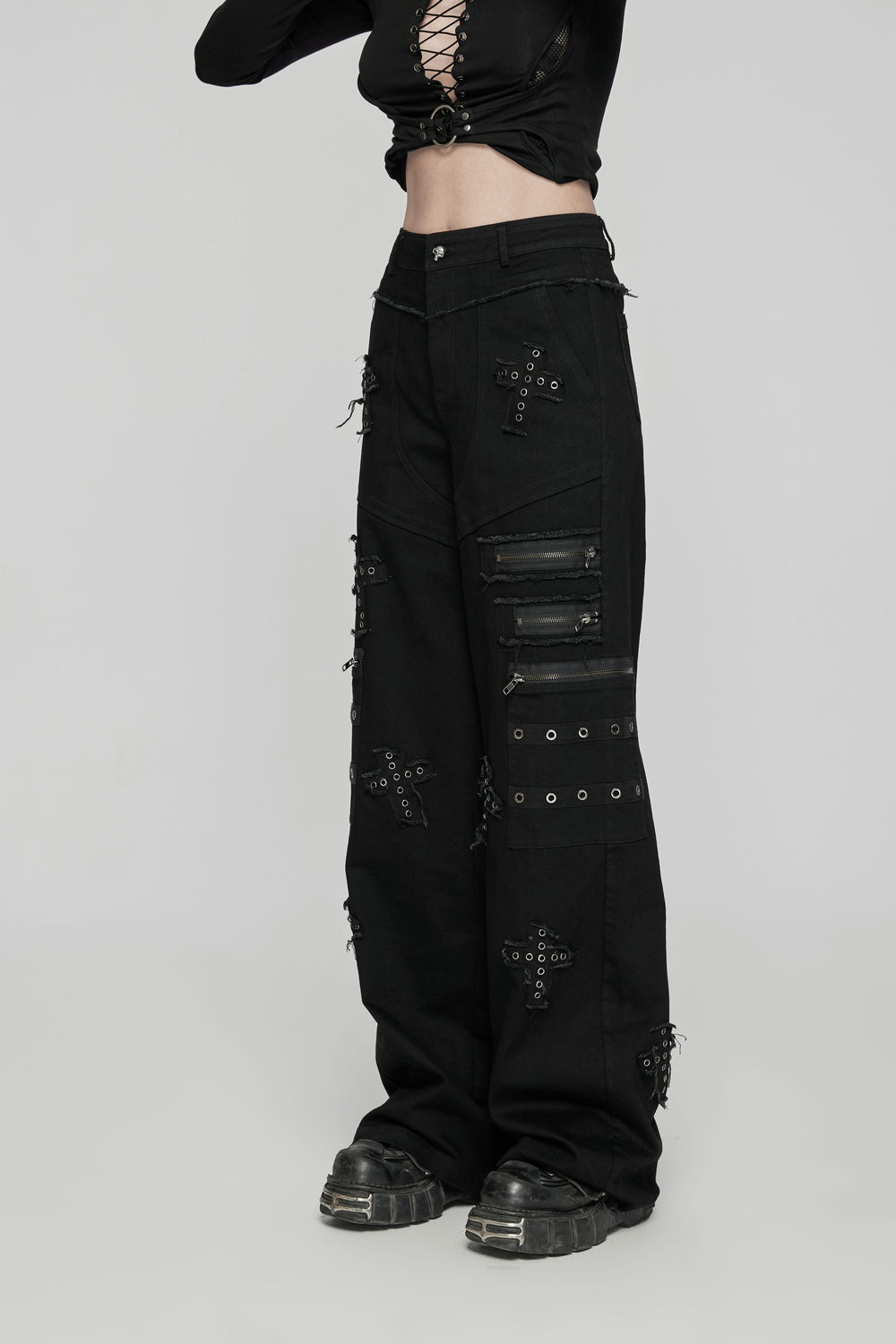 Punk straight-leg denim pants featuring cross patches, zipper accents, and a bold gothic design for a rebellious style.