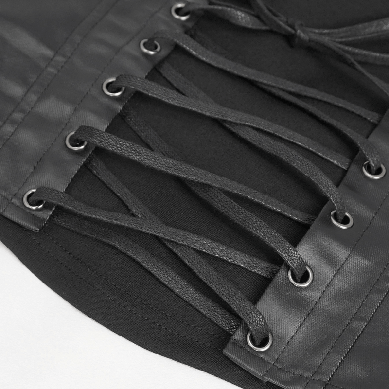 Close-up of black lace-up detail on a gothic strappy camisole, showcasing punk style and raw-edged design.