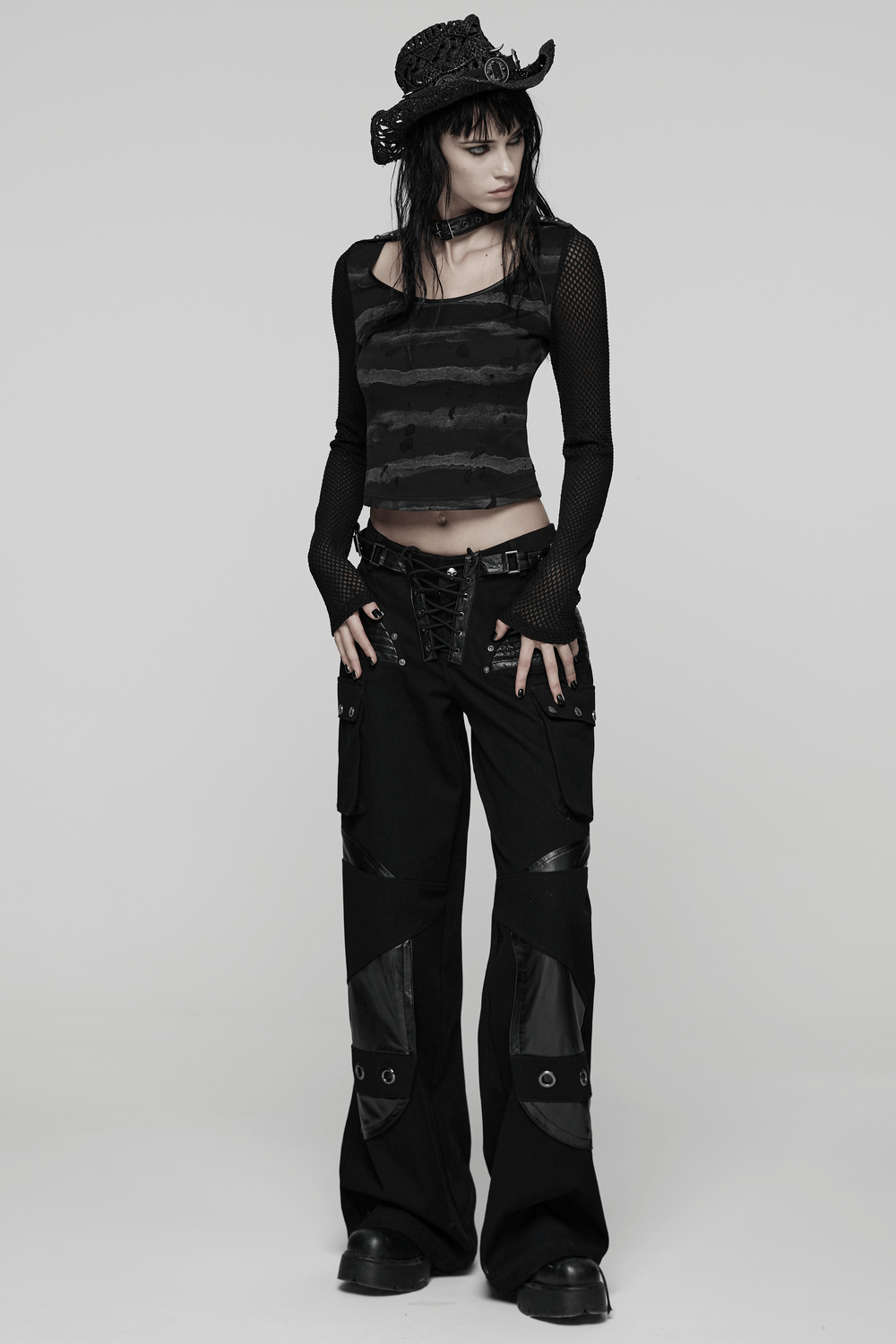 Punk Striped Mesh Top with Decorative Loop Collar worn with edgy pants and cowboy hat, showcasing rebellious style and attitude.