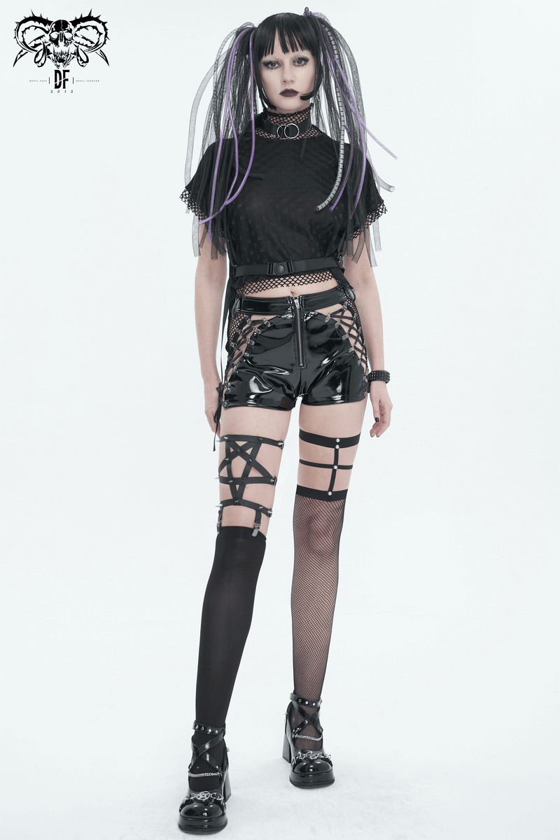 Punk fashion model in asymmetrical outfit with studded garter, showcasing edgy style and alternative aesthetics.