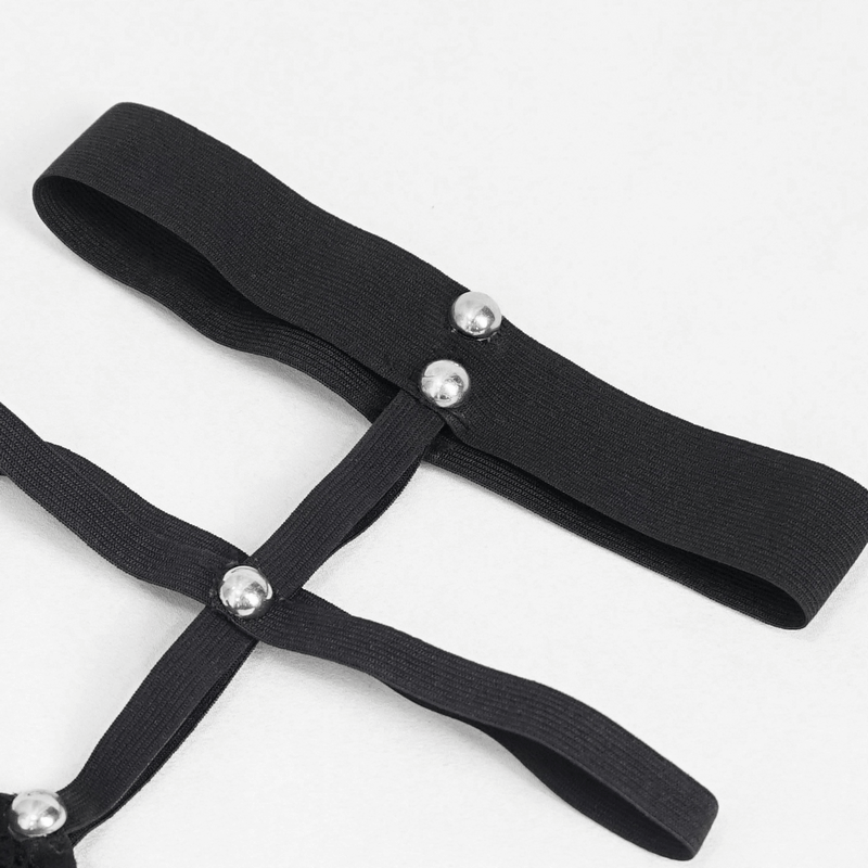 Black garter straps with silver studs, adding punk edge to alternative fashion accessories.