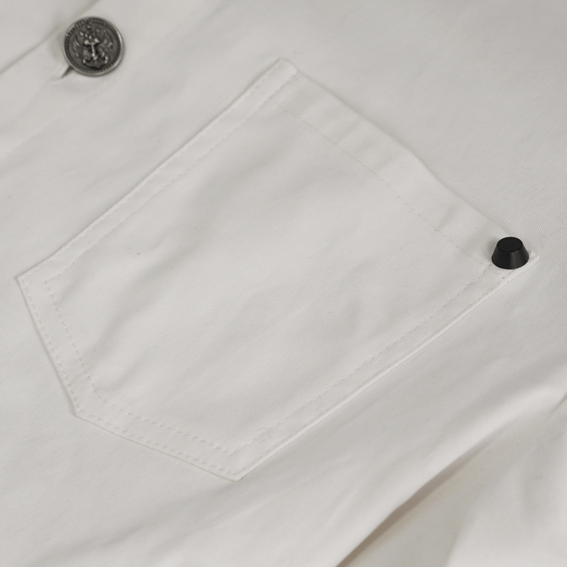 Close-up of a stylish white long sleeve shirt pocket with a button detail, showcasing punk fashion elements.