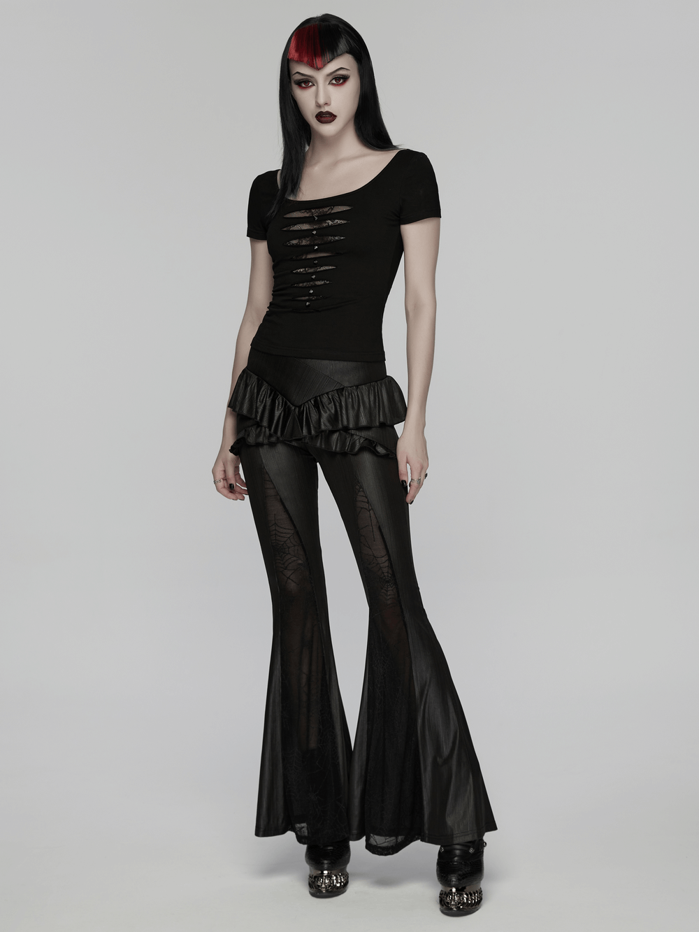 Punk Style Mesh Lace Cutout Short Sleeve T-shirt paired with flared black pants for an edgy fashion look.