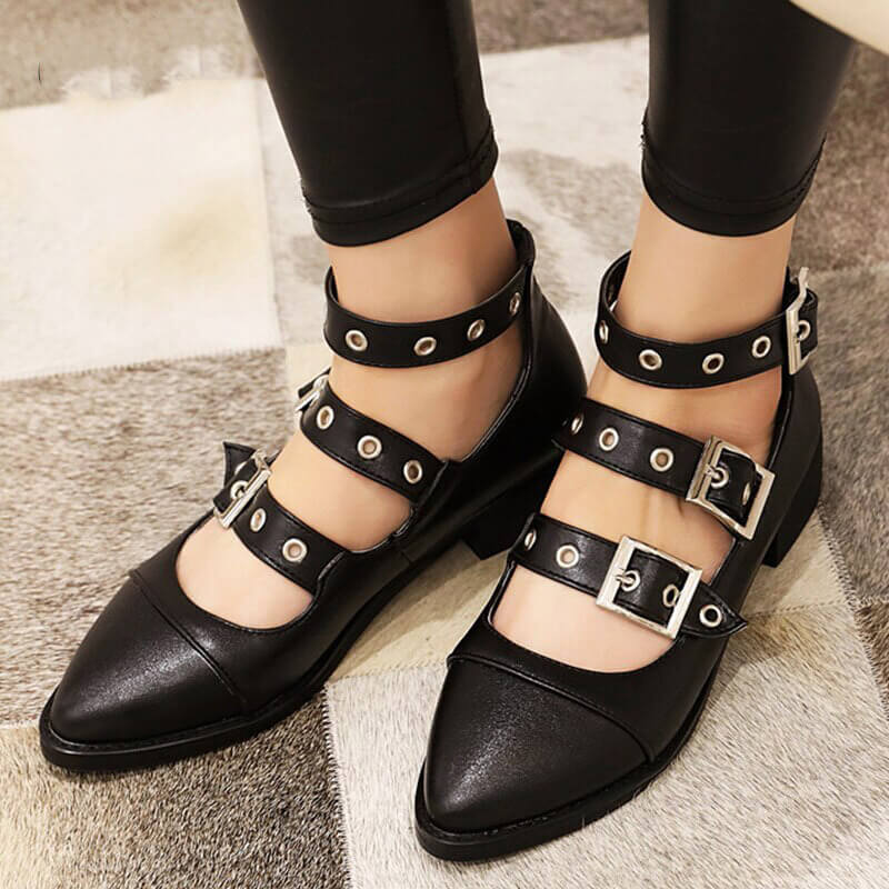Punk style women's PU leather pumps with buckle straps, perfect for alternative fashion lovers.