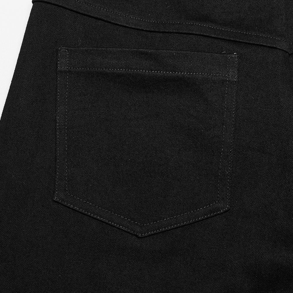 Detail of a black denim jean pocket, showcasing sleek design and sturdy stitching.