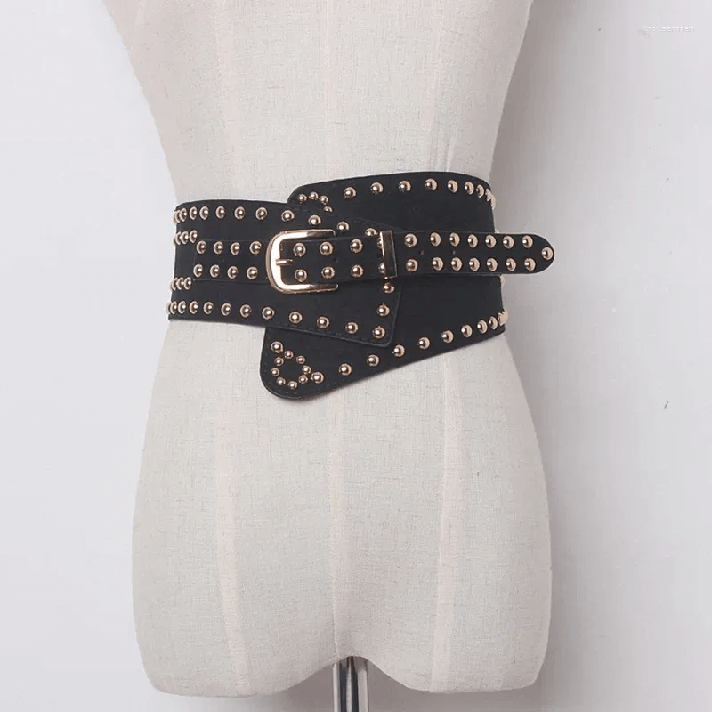 Punk style women's wide buckle belt in black PU leather with rivets, showcasing a unique irregular design.