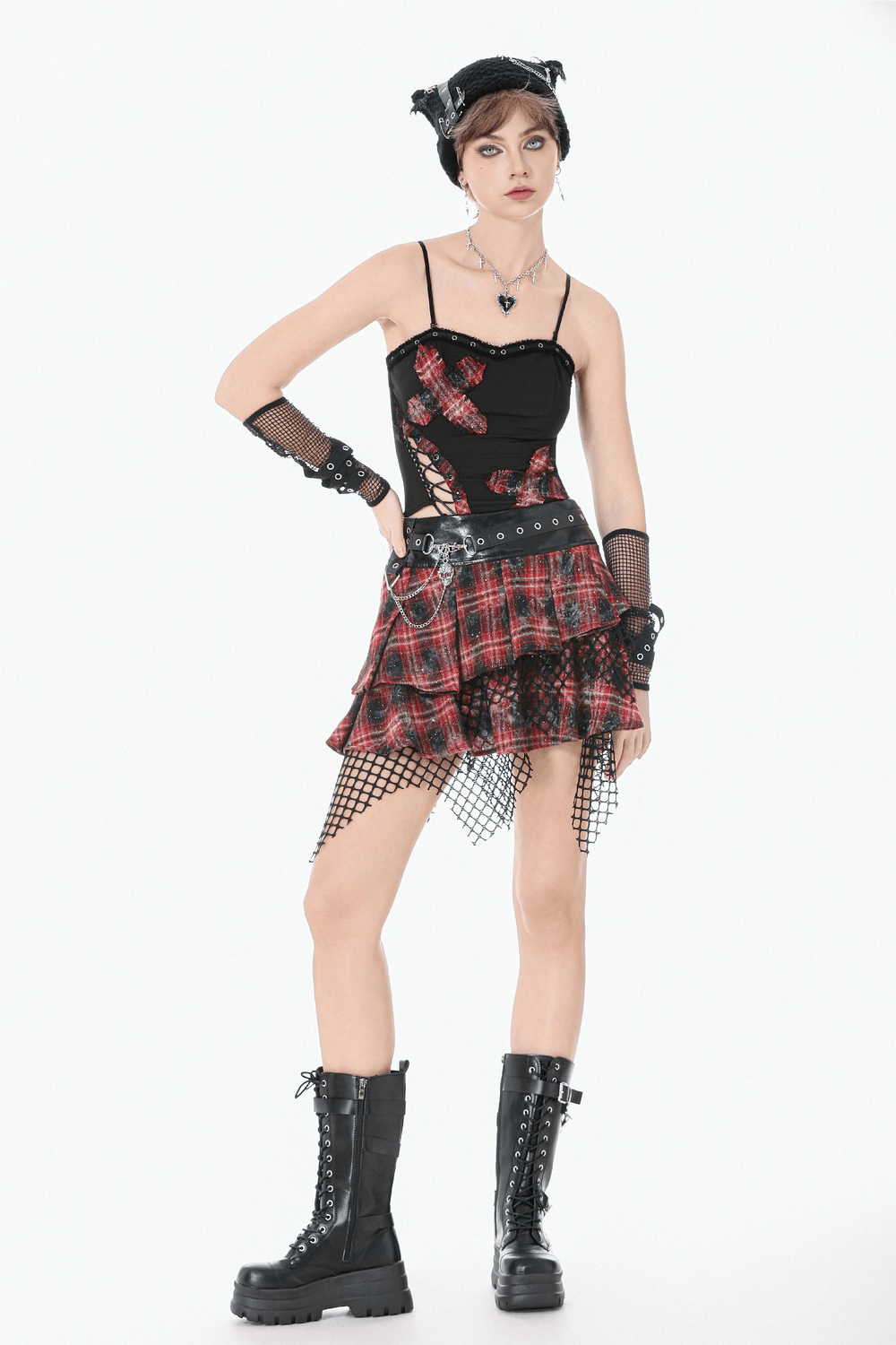 Punk Tartan Layered Mini Skirt with Chain Detail worn with black corset and chunky boots, showcasing a chic goth look.