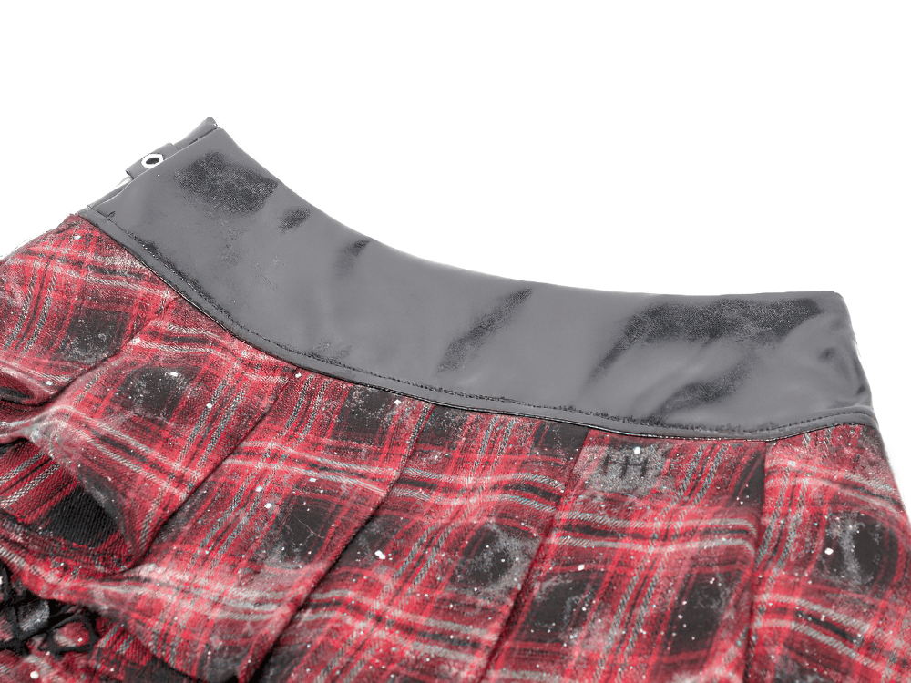 Punk Tartan Layered Mini Skirt with Chain Detail featuring a glossy faux leather waistband and red plaid fabric.