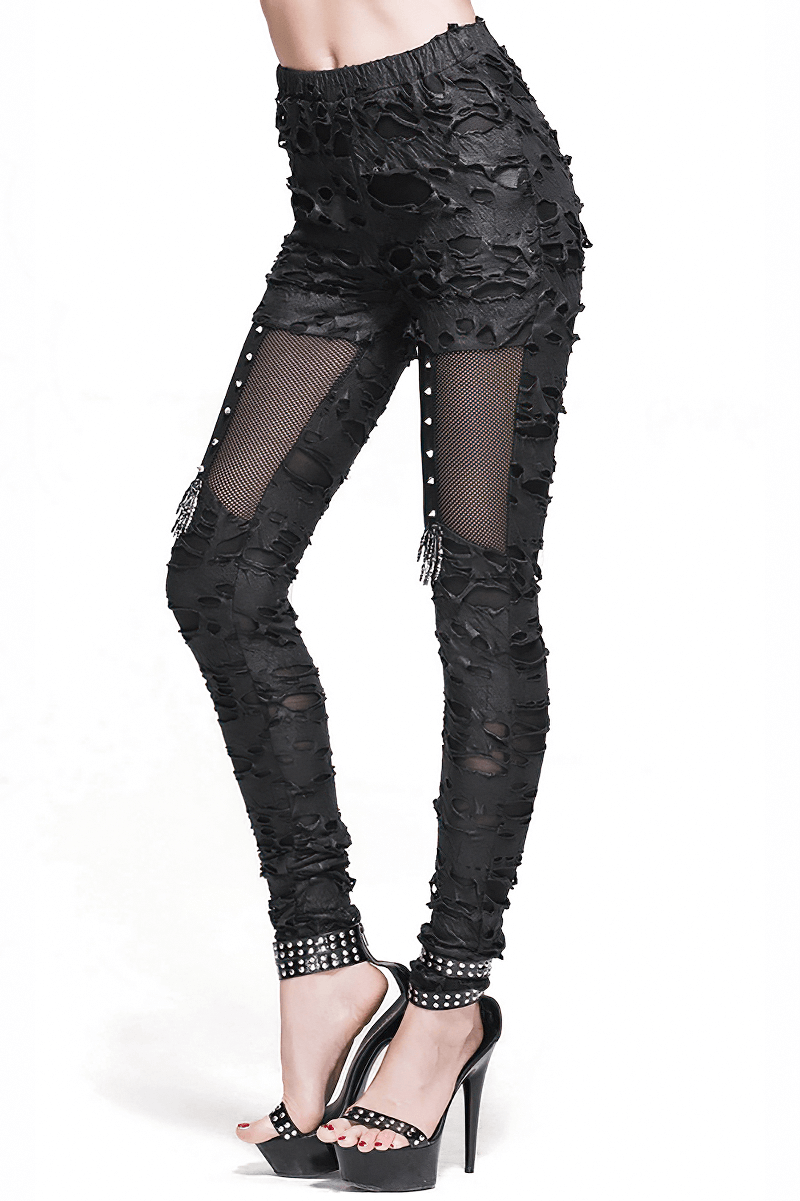 Stylish black punk tattered leggings for women with torn inserts and mesh panels, perfect for gothic fashion.
