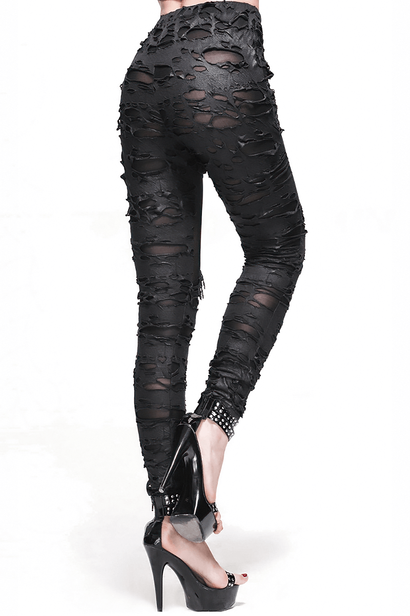 Punk tattered black leggings for women, featuring torn inserts and a stylish gothic design, perfect for edgy outfits.