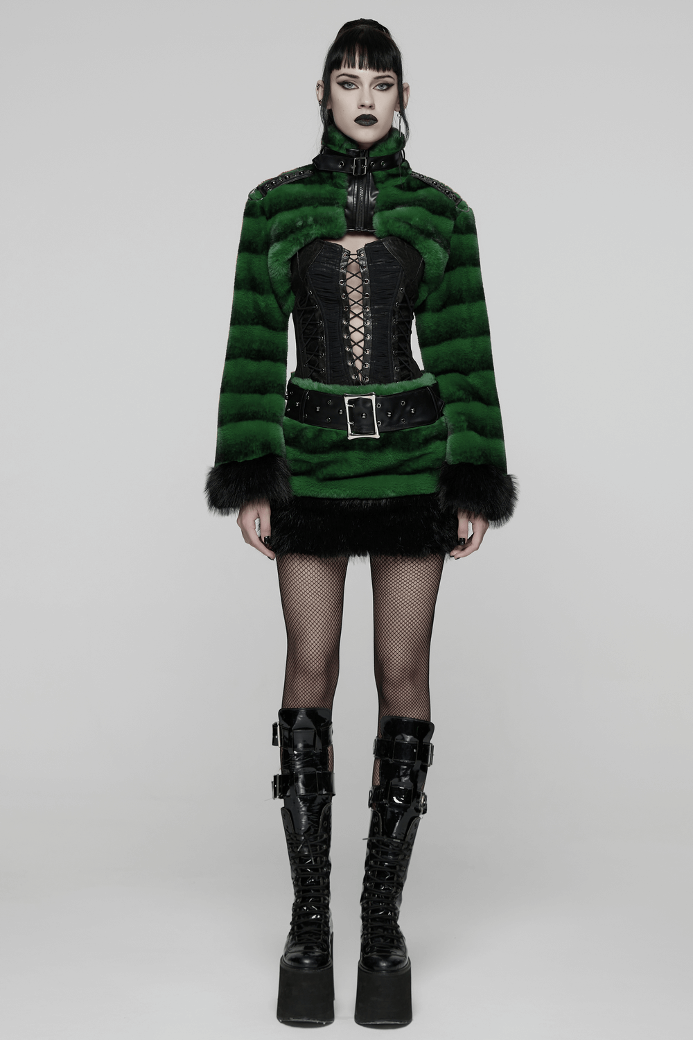 Model wearing a Punk Ultra-Soft Fur Jacket with Studded Shoulder Straps over a stylish outfit for a bold look.