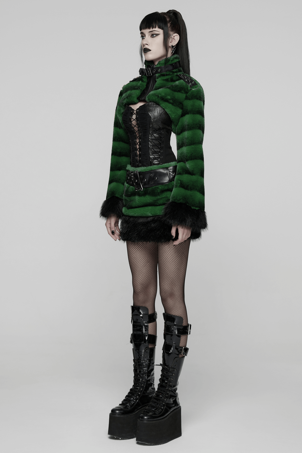 Punk Ultra-Soft Fur Jacket with Studded Shoulder Straps worn by a model in a striking pose.
