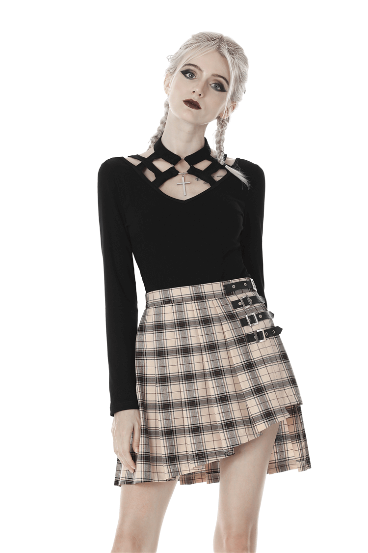 Gothic black long sleeve top with metal cross paired with plaid skirt, perfect for edgy fashionistas.