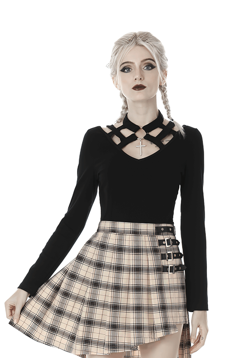 Gothic black long-sleeve top with metal cross, paired with plaid skirt, perfect for edgy fashion lovers.