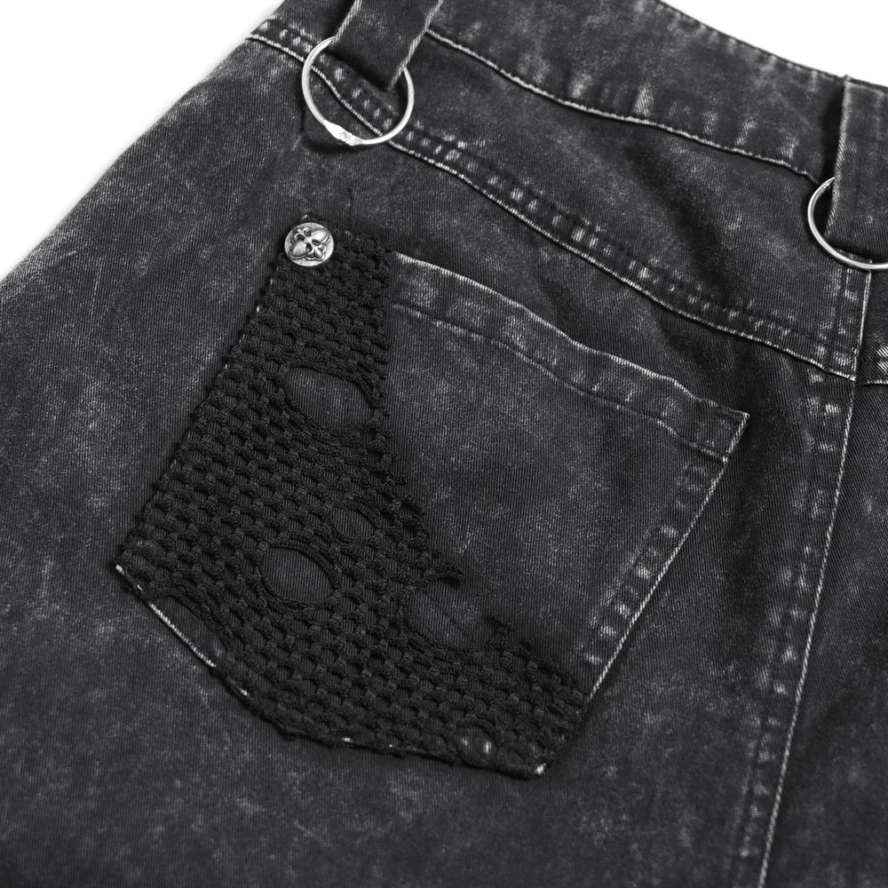 Close-up of the distressed mesh panel on Punk Wide Leg Jeans with Distressed Mesh Panels showing unique eyelet details.