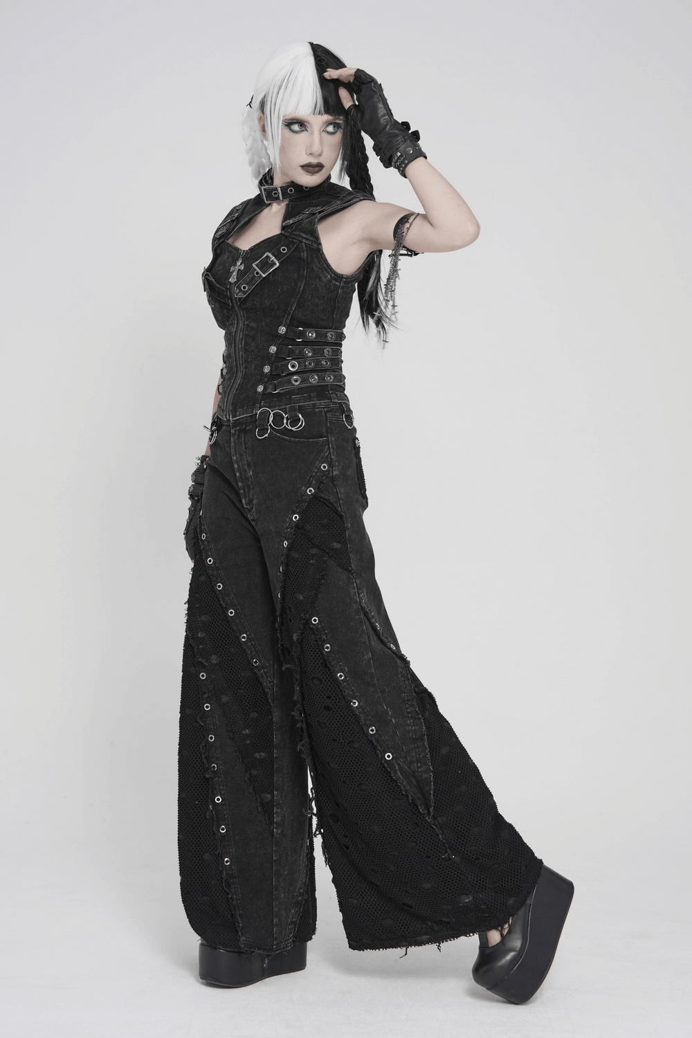 Punk Wide Leg Jeans with Distressed Mesh Panels worn by a model showcasing an edgy gothic style.