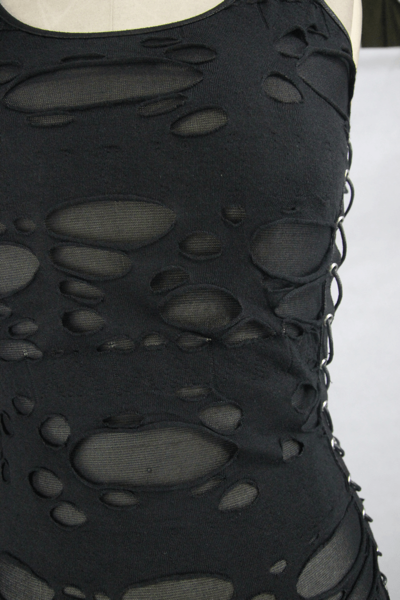 Close-up of a women's punk black tank top with irregular holes and lace-up sides, showcasing a trendy goth fashion style.