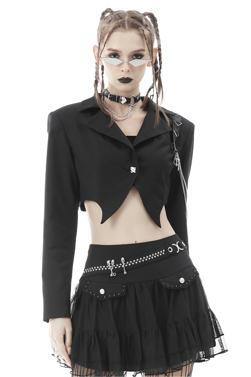 Punk women's cropped jacket with chain details, styled with edgy accessories for a bold goth look.