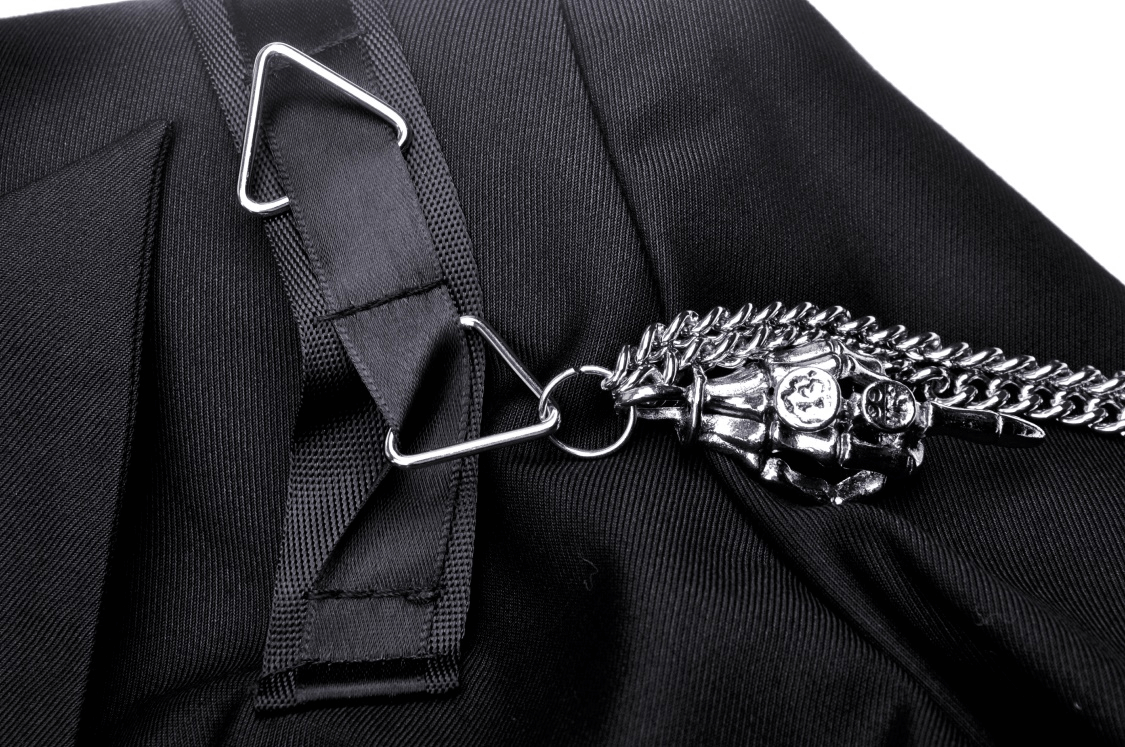 Close-up of chain and clasp detail on a punk women's cropped jacket, showcasing edgy embellishments.
