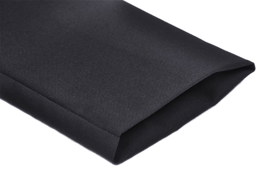 Close-up of a black fabric sleeve, showcasing a sleek texture perfect for punk-inspired apparel.