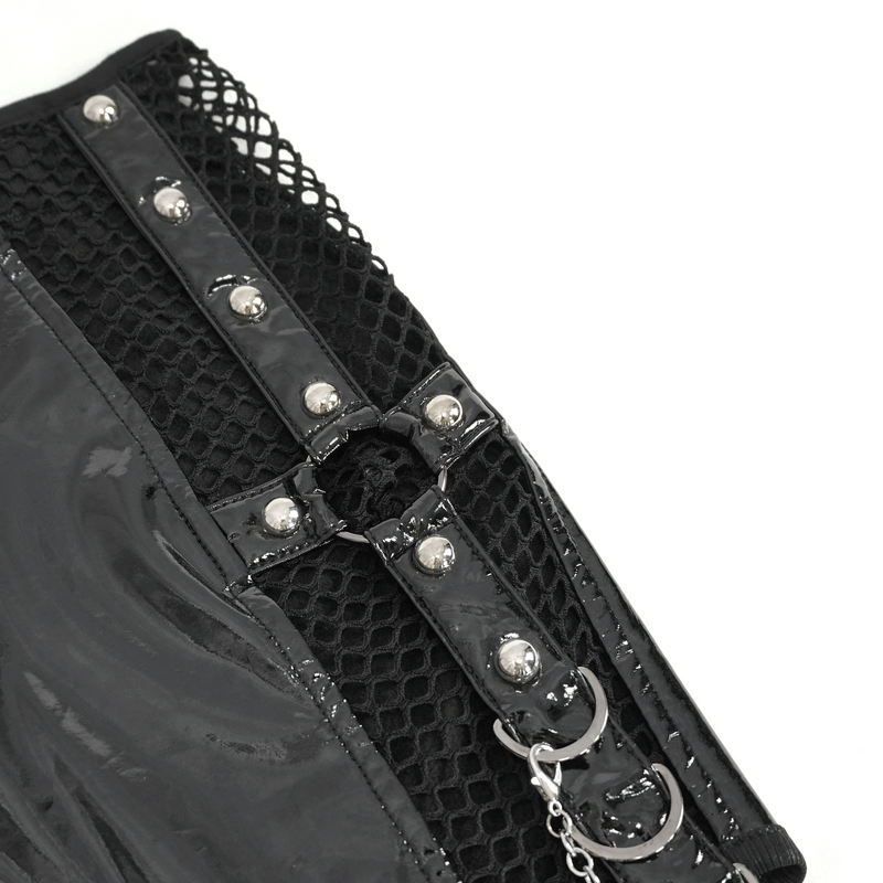 Close-up of a punk women's irregular patent leather skirt with mesh detail and bold silver studs, showcasing edgy style.