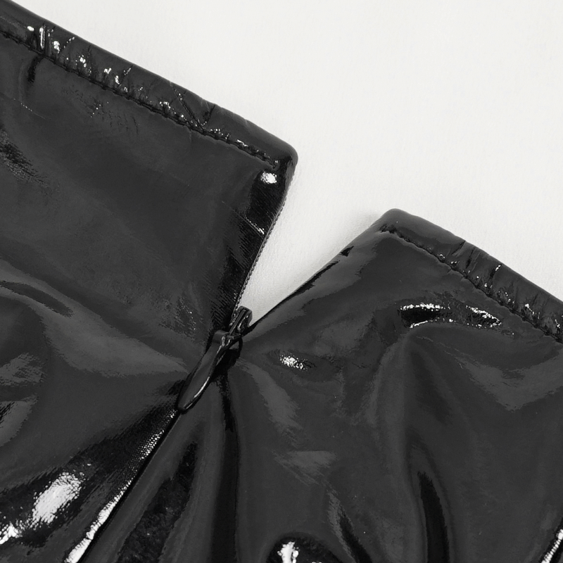 Close-up of punk women's irregular patent leather skirt zipper detail, showcasing edgy style and quality craftsmanship.