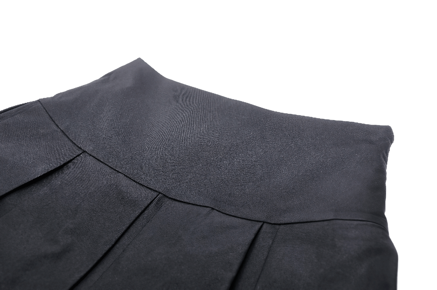 Black pleated fabric of a punk women's mini skirt, showcasing lace trim details and edgy design.