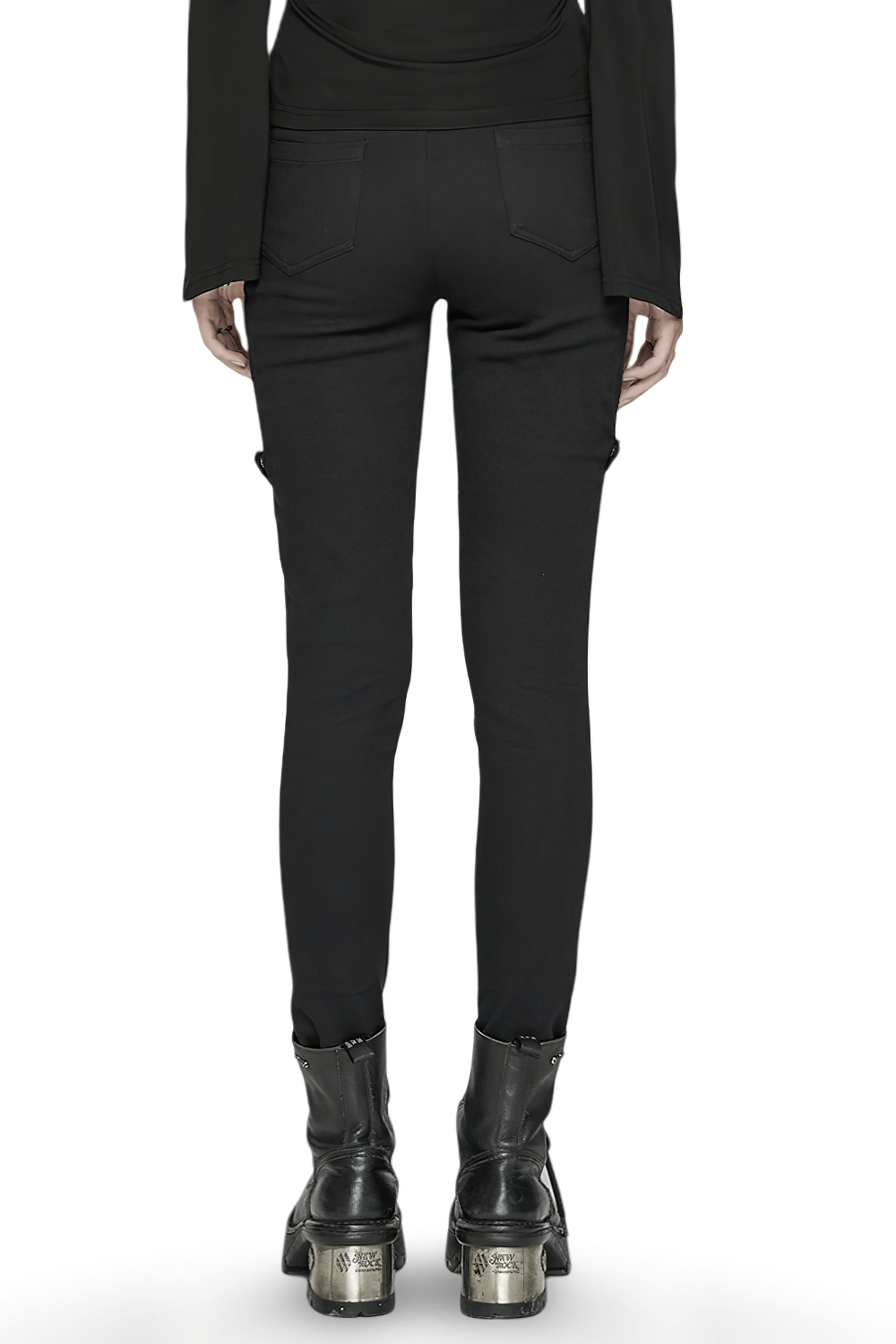 Back view of gothic punk women's trousers with buckles and straps, paired with stylish black boots.
